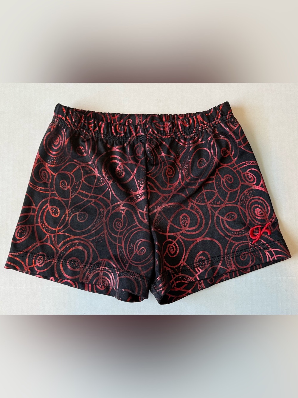 GK Black Athletic Shorts with Red Swirl Print
